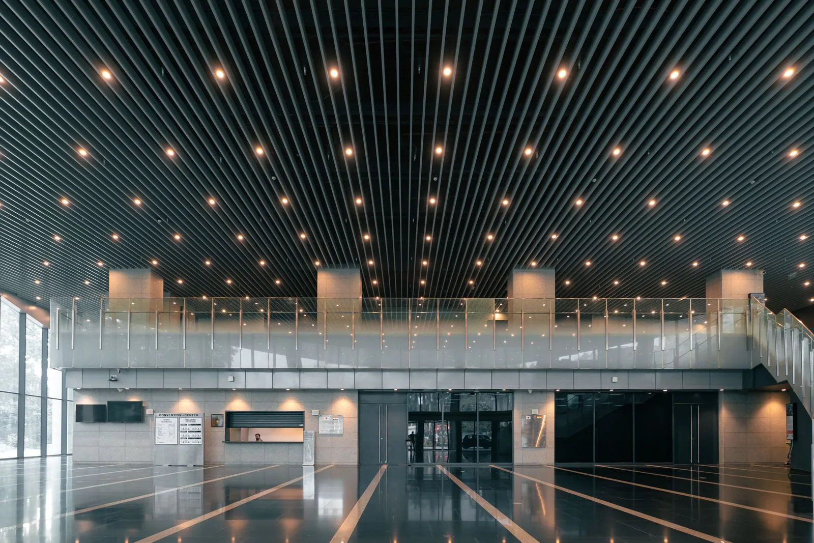 A pristine modern commercial lobby, cleaned and reset at the end of the day.
