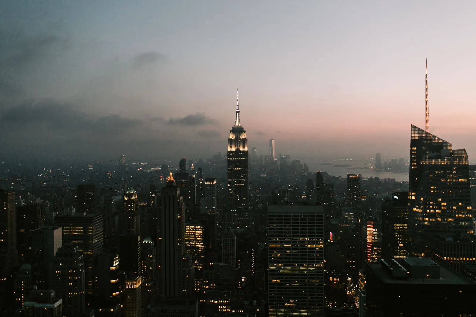 The New York City skyline at dusk.
